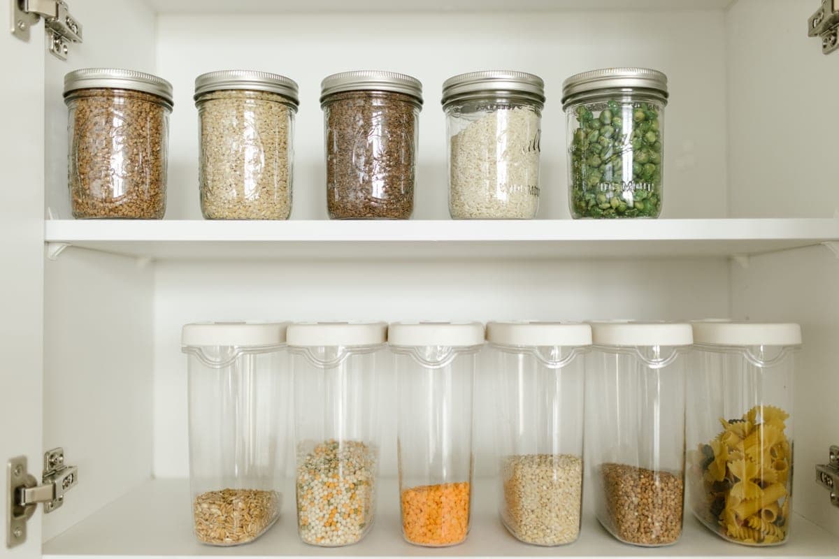 Glass and plastic food storage containers side by side