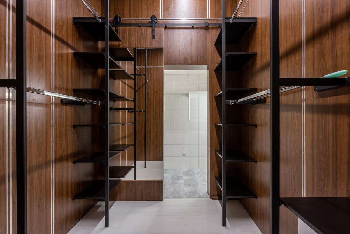 Wooden shelving boards fitted inside a closet